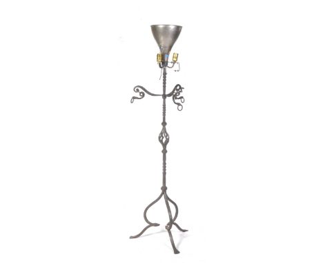 An early 20th Century wrought iron lamp standardFitted with an industrial type light shade upon a twisted and openwork shaft,
