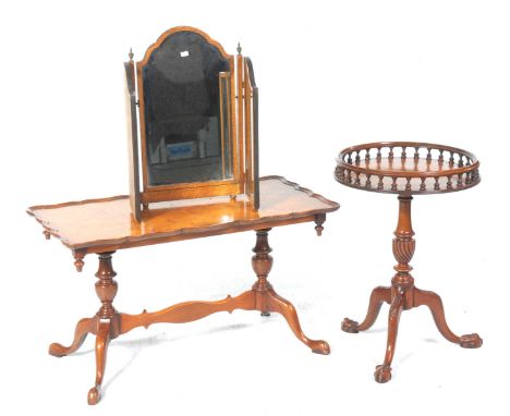 A reproduction mahogany tripod table, a walnut coffee table and a triple mirrorThe Georgian style tripod table with a circula