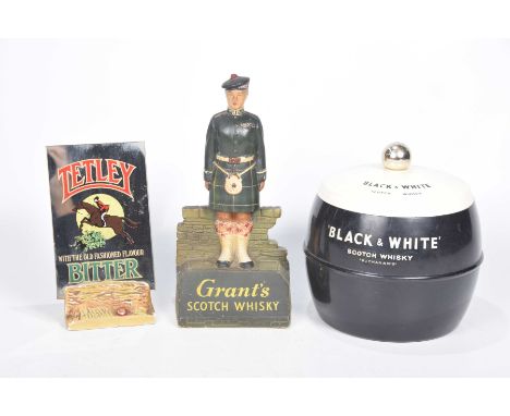 A collection of various vintage pub memorabiliaTo include a black and white scotch whisky ice bucket, a Grants scotch whisky 
