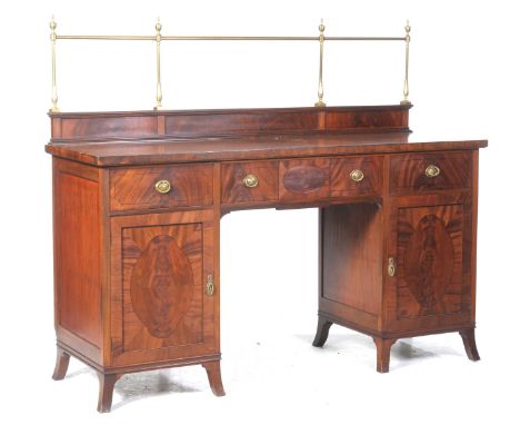 A mahogany Georgian revival sideboard, early 20th CenturyThe raised back with a brass rail gallery above a crossbanded rectan