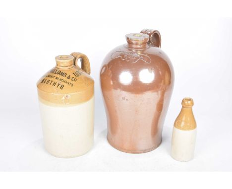A salt glazed stoneware flagon, R ChandlerOf swelling form with a loop handle, impressed with the merchants name, a second st