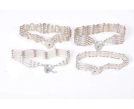 Four silver gate-link braceletsOf conventional form (4)