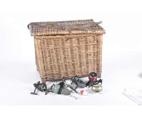 A collection of fishing reelsTo include a French Sur-mitic South Bens 707 reel, a Svangsta ABU 505 reel, a K. P. Morritts Int