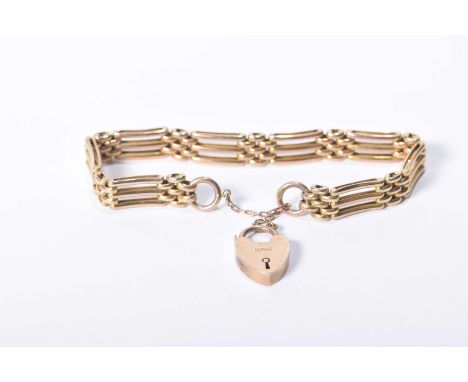 A 9k gold gate-link braceletWith a heart padlock, weight approx 15g