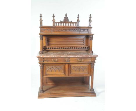 A Victorian walnut and rouge marble buffet sideboardThe super structure raised back with Gothic leafy finials above a single 