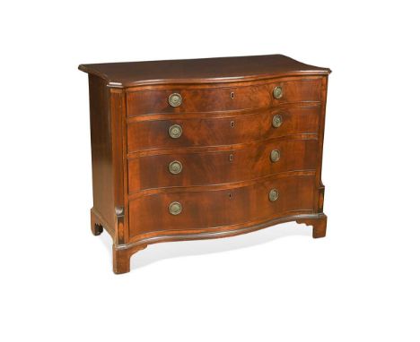 A George III mahogany serpentine chest, with four long graduating cockbeaded drawers flanked by moulded pilasters on bracket 