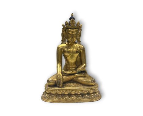 A Chinese gilt bronze Bodhisattva, 20th century, seated in meditation wearing an elaborate crown, on a double lotus dais40cm 