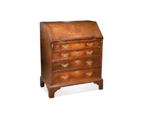 An early George III mahogany bureau, fall front with strip moulding, over four drawers with original brass handles, on bracke