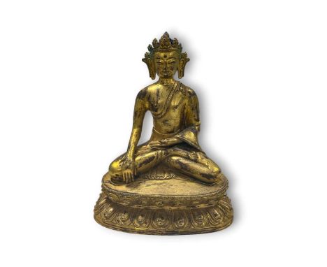 A Chinese gilt bronze figure of the Bodhisattva Avalokiteshvara, 20th century, crowned and upon a double lotus dais18cm high