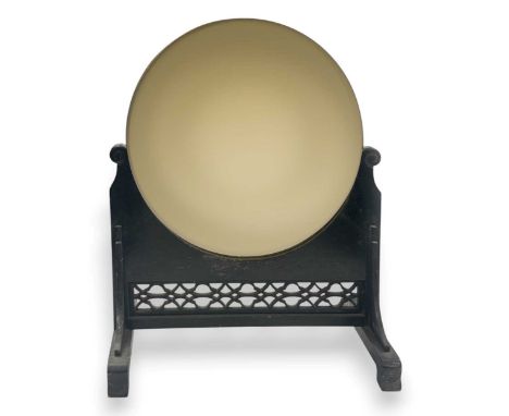 A Japanese large bronze mirror, possibly for use by Kabuki actors, 19th century, plain, on an associated wood stand40cm diame