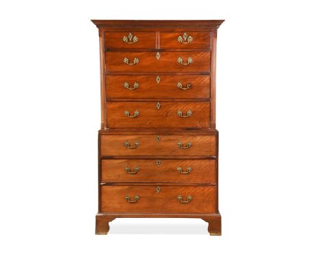 A George III mahogany chest on chest, the Greek key moulded cornice above two short and three long drawers with canted fluted