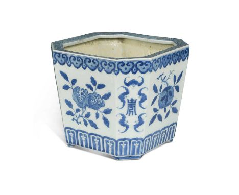 A Chinese blue and white porcelain octagonal planter, Qing Dynasty, 19th century, key pattern border, the fascias painted wit