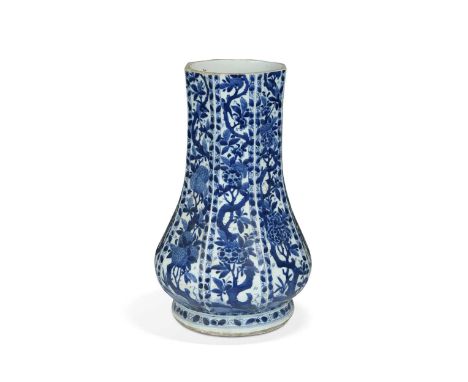 A Chinese blue and white porcelain octagonal panelled vase, Kangxi Emperor, circa 1690, the neck cut-down, painted with diver