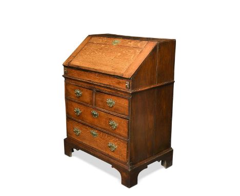 A George II oak bureau, with internal well above two short over two long drawers on bracket feet110 x 84 x 53cm