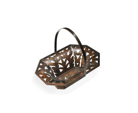 An Anglo Indian rosewood and brass inlaid octagonal bread basket, 19th century, with pierced foliate scroll sides and central