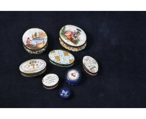A collection of eight enamel patch boxes, late 18th or early 19th century,  of circular and oval shapes, decorated with figur