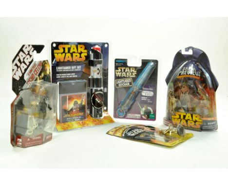 Various Star Wars issues, all unopened, comprising Keychain, Light Saber plus figures. Excellent.  Enhanced Condition Reports