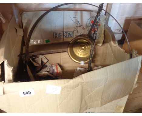 A brass and ceramic hanging metal oil lamp