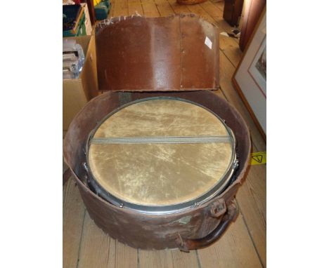 A vintage jazz snare drum and hi-hat cymbal, both in travelling cases