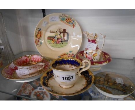 A 19th Century Spode cup and saucer hand painted with roses in gilt border - sold with a Prattware pot lid with fishing scene