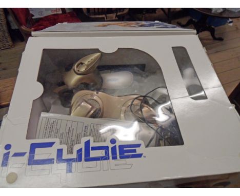 A boxed i-Cybie robot dog