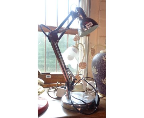 A modern anglepoise style desk light