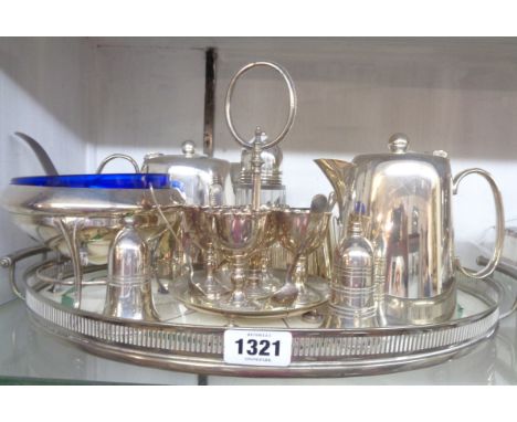 A hotel plate tea set, egg cruet, caster and bowl on ceramic base tray