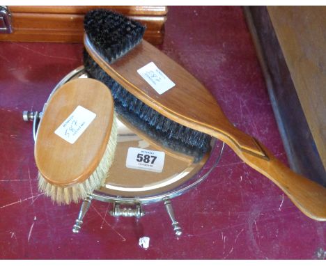 A vintage chrome easel shaving mirror - sold with two wooden clothes brushes