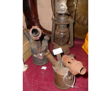 Two vintage brass blowtorches - sold with a hurricane lamp