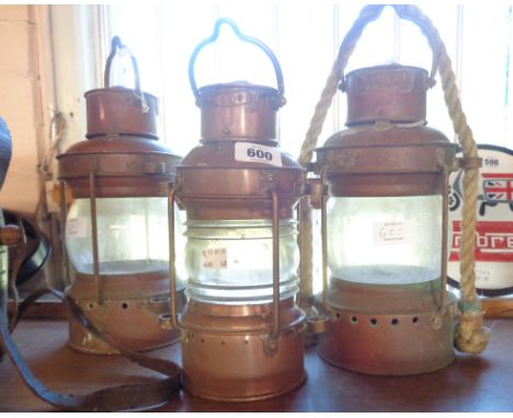 Three small vintage copper ships anchor lights