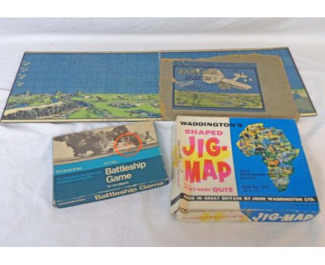 A vintage WH Smiths Battleship game, Waddington shaped jig-saw map of Africa, and a Barrage game board