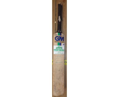 A vintage Gunn &amp; Moore cricket bat signed by the 1984 Nottinghamshire CCC team