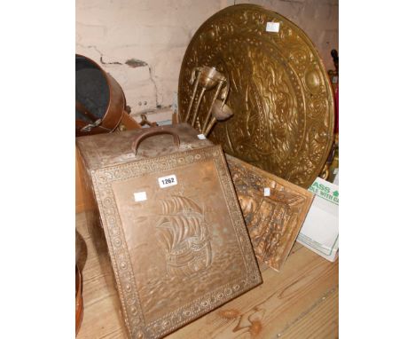 An embossed brass coal box, brass charger, hangling light, aluminum plaque, etc.