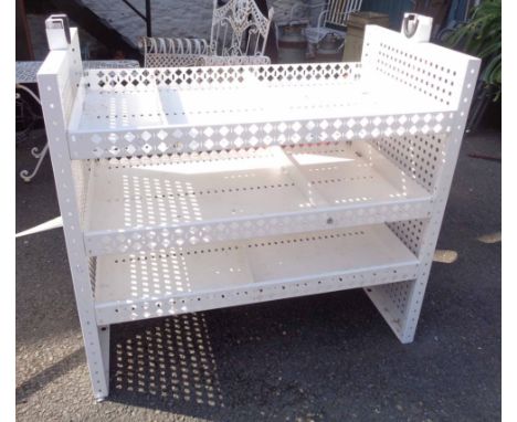 A metal van racking shelf unit