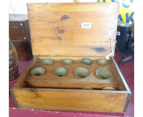 A vintage cased set of small bells and stand (numbered octave)