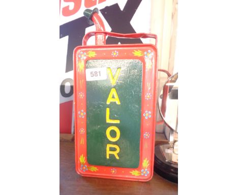 A vintage Valor paraffin can later painted in the bargeware style