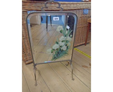 A brass framed mirrored firescreen