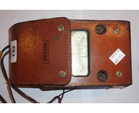 A vintage megameter in leather case - sold with a Casio HR10 mini printing calculator