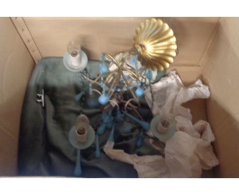 A vintage wrought hanging chandelier with blue glass drops and beaded swags