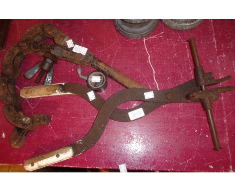 A vintage metal tyre lever and tyre gauge - sold with a vintage pipe cutter