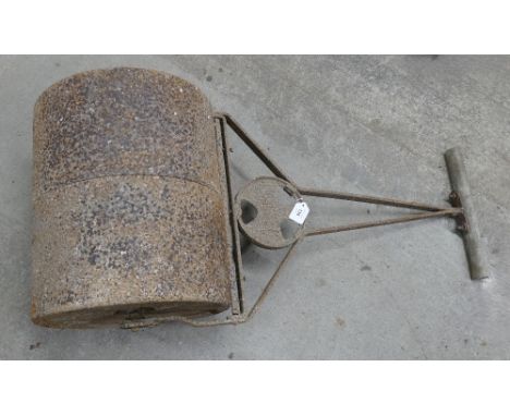 Antique Ironcrete garden roller. 