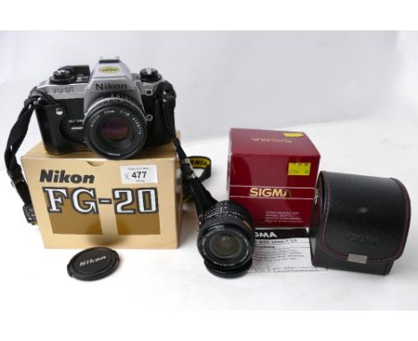 Boxed Nikon FG20 camera with Nikkor 50 mm lens and boxed Sigma super wide 1:2.8 lens 