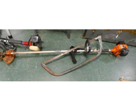Petrol strimmer and saw 
