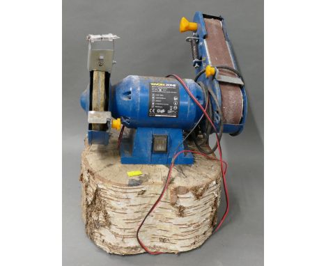Workzone bench grinder mounted on tree section. 