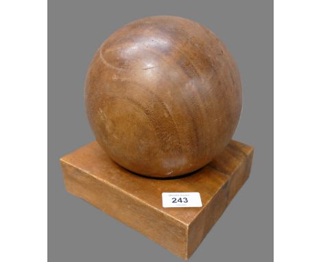 Lathe turned wooden sphere on plinth desk top art. 