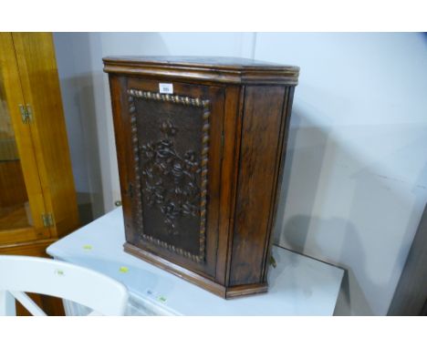 Oak carved front corner cupboard 