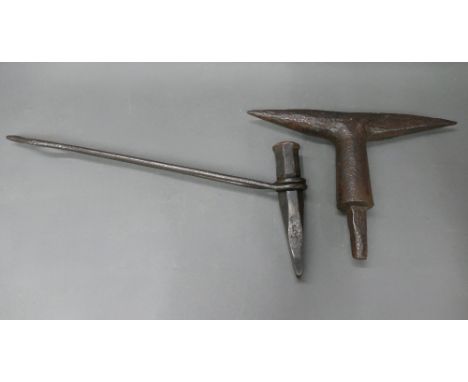 Antique blacksmiths anvil spike stake tool and antique blacksmiths rodded chisel. 