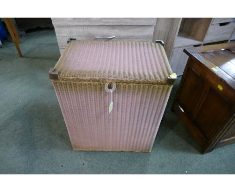 Lloyd Loom pink laundry basket 