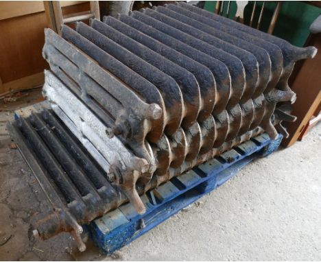 Pair of antique 3 column ornate cast iron radiators measuring approx. 38" wide, 10" deep, 32" high, and a matching antique 2 