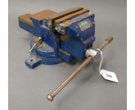 Tisson bench vice on swivel base with 4" jaws.